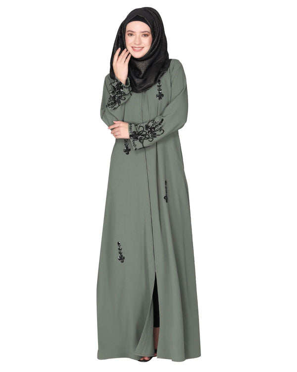 Rich hand embroidered front open dead mint abaya with itricate motif of glittering black beads